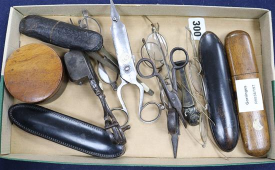 A collection of assorted antique spectacles, a set of B. Gheri hydrostatic balls and three pairs of snuffers